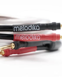 Two pairs of audio cables with 'melodika' branding
